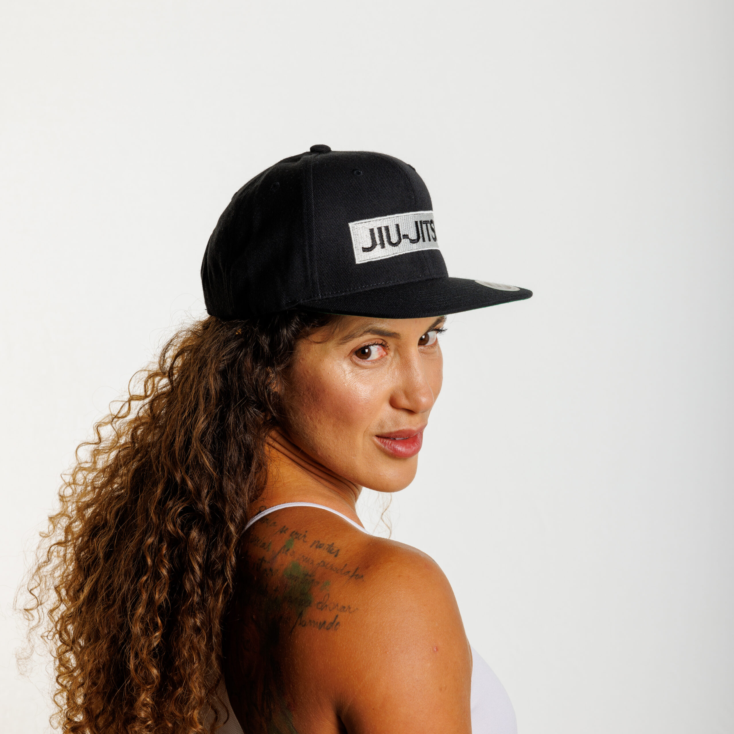 Example of product photography, woman wearing a Hunter Fightwear hat