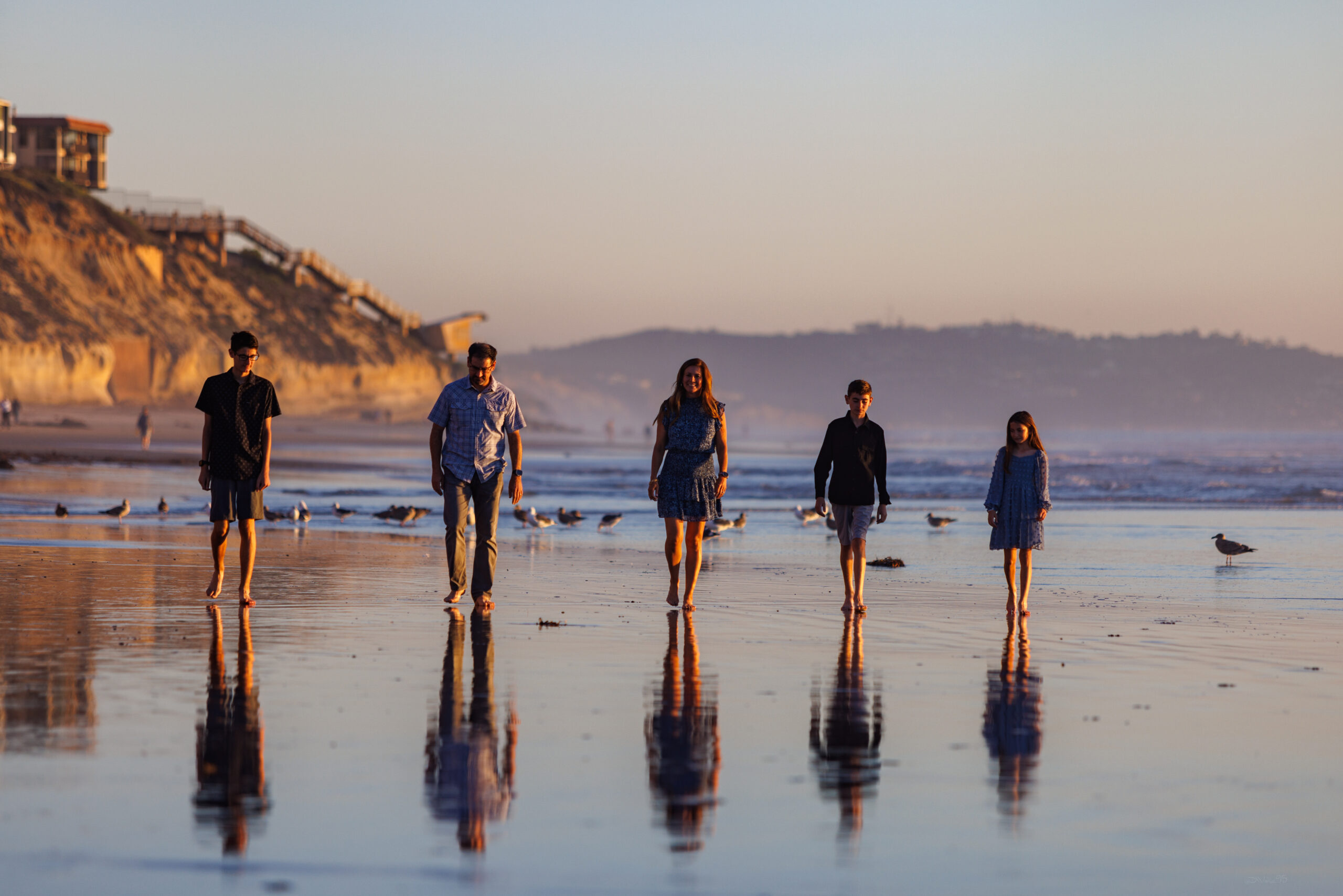 Family walking on the beach